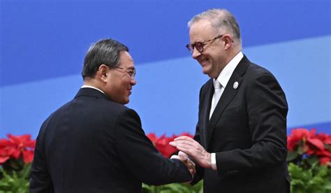 Australian and Chinese leaders meet in Beijing while their countries try to mend ties